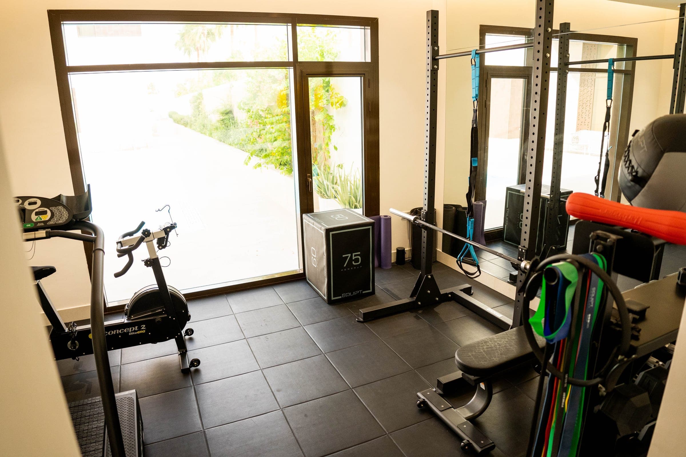 Private residence. The pool-view home gym.